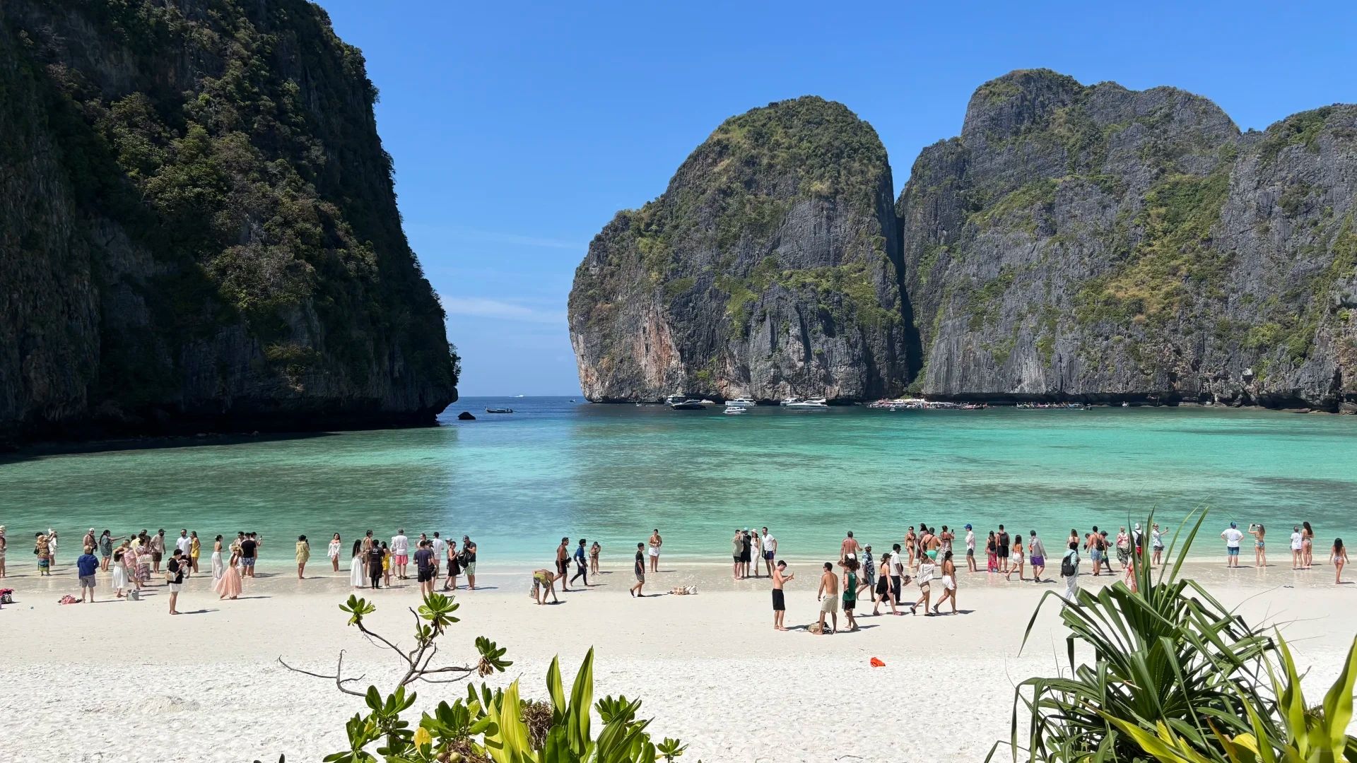 Limestone and clear water at Koh Phi Phi, seen by day from a boat or a viewpoint. Come for the scenery on a day trip or one overnight. It is a weak choice for a long romantic stay.