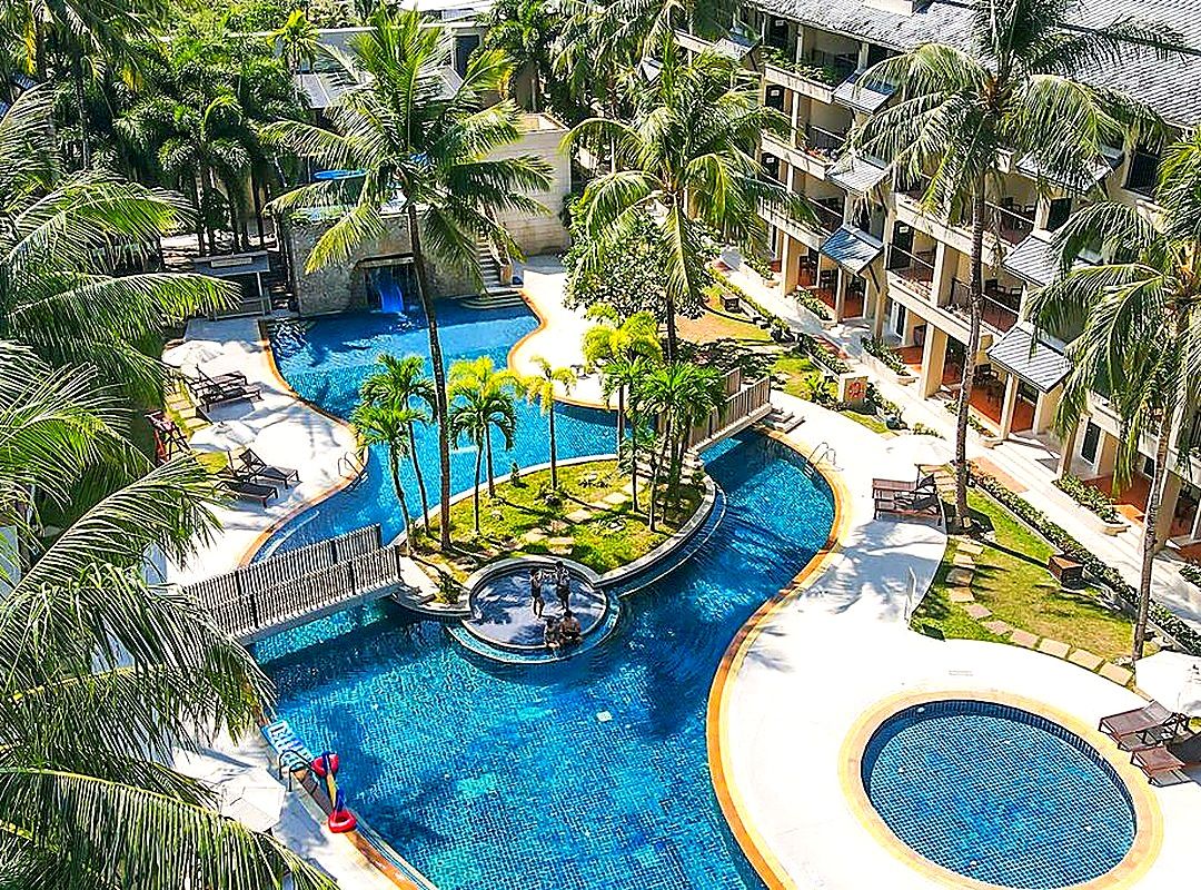 Low-season resort pool — room upgrades without the crowds